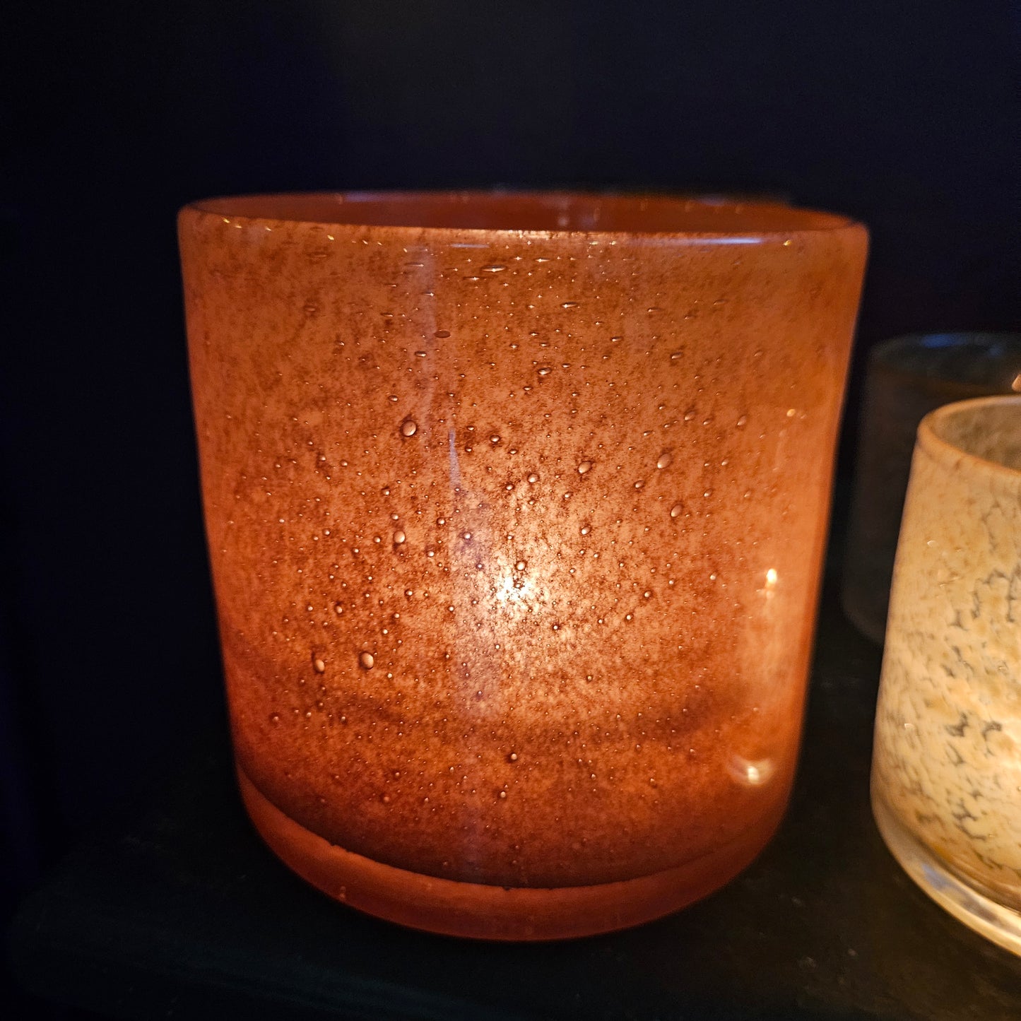 Ljuslykta kruka i glas orange